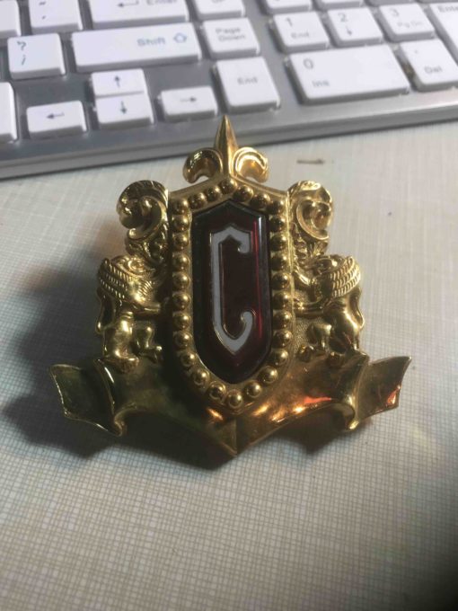 54 Chrysler Grille center emblem